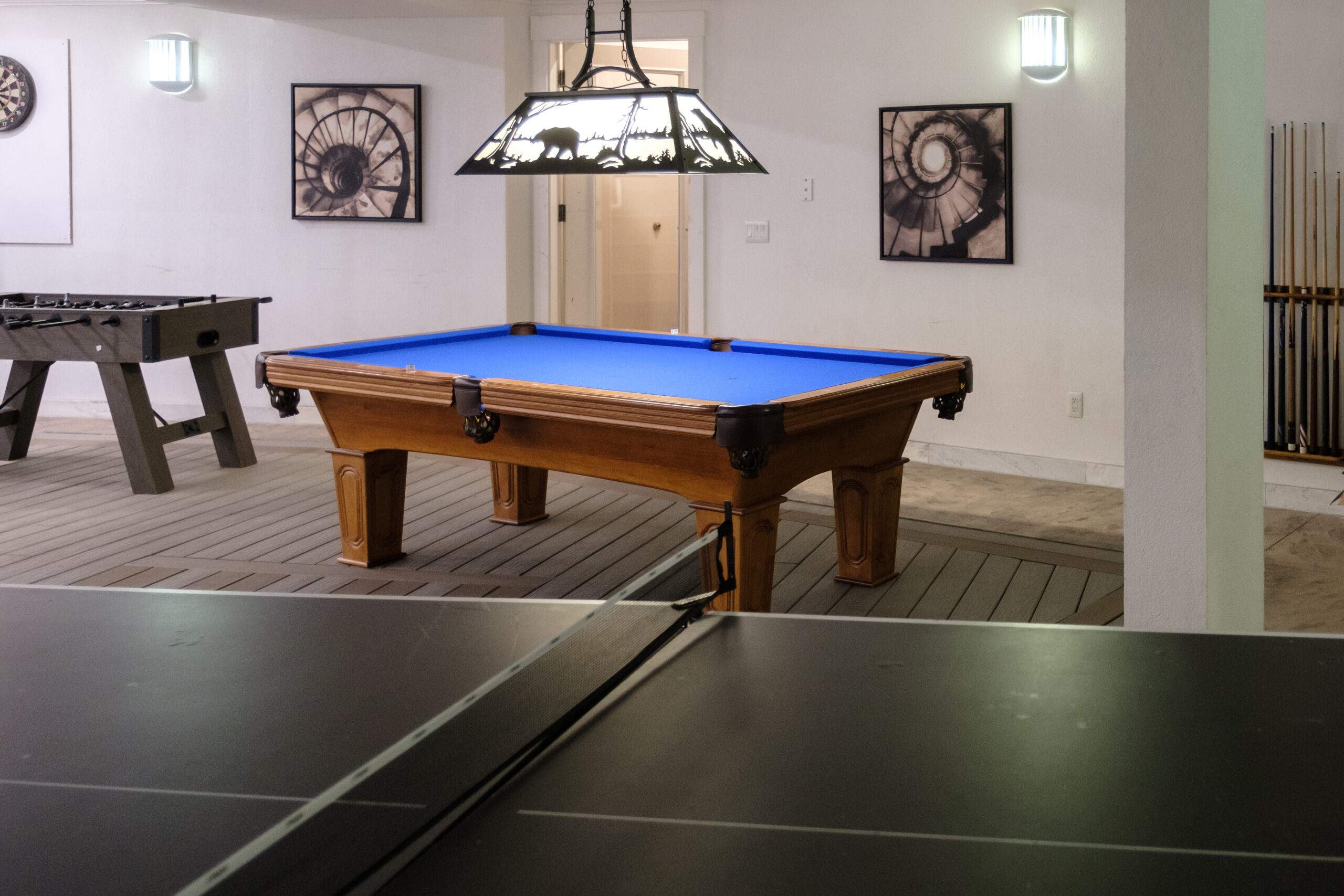 Pool table in the games room at Top of the World Ranch Milan IL residential rehab, part of recreational amenities including billiards for leisure and social engagement during treatment.