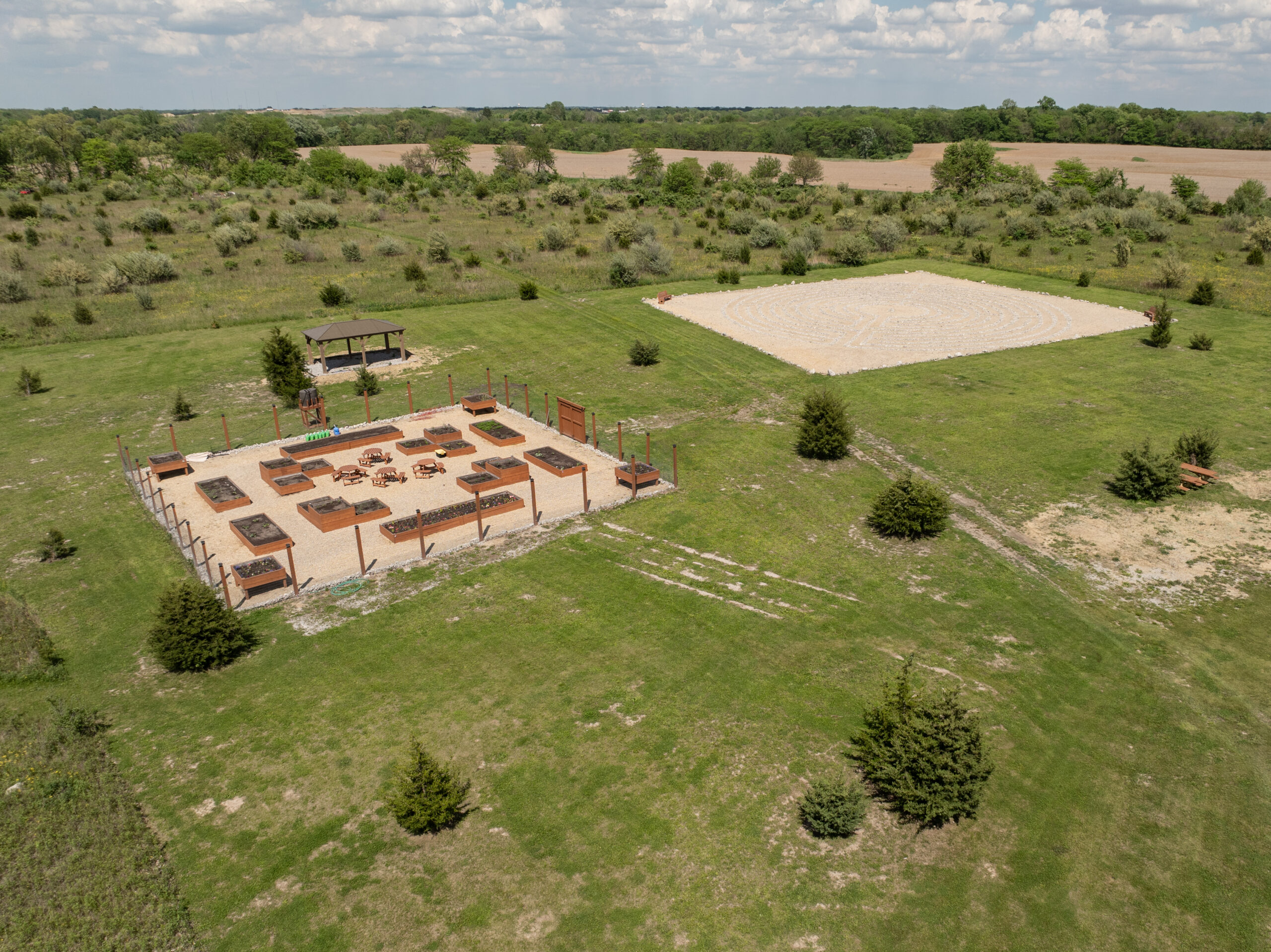 Peaceful outdoor labyrinth and contemplative garden at Top of the World Ranch addiction treatment facility, offering a tranquil space for spiritual and emotional restoration.
