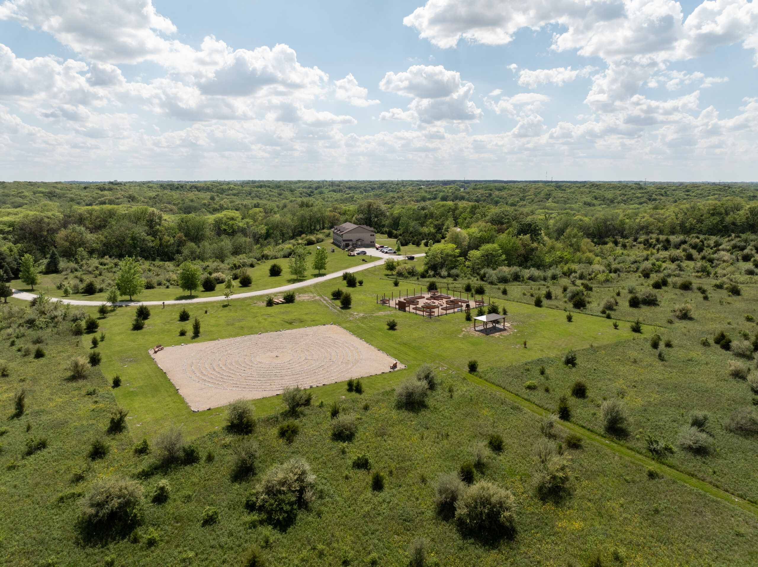 Serene meditation labyrinth and garden path at Top of the World Ranch 315-acre ranch in Milan IL, supporting mindfulness, reflection, and nature-based healing in recovery.