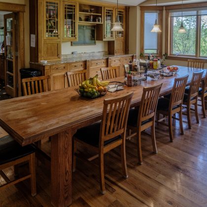 Bright dining room in the Main Lodge at Top of the World Ranch addiction rehab Milan IL, providing nourishing communal meals in a warm, home-like setting for recovery support.